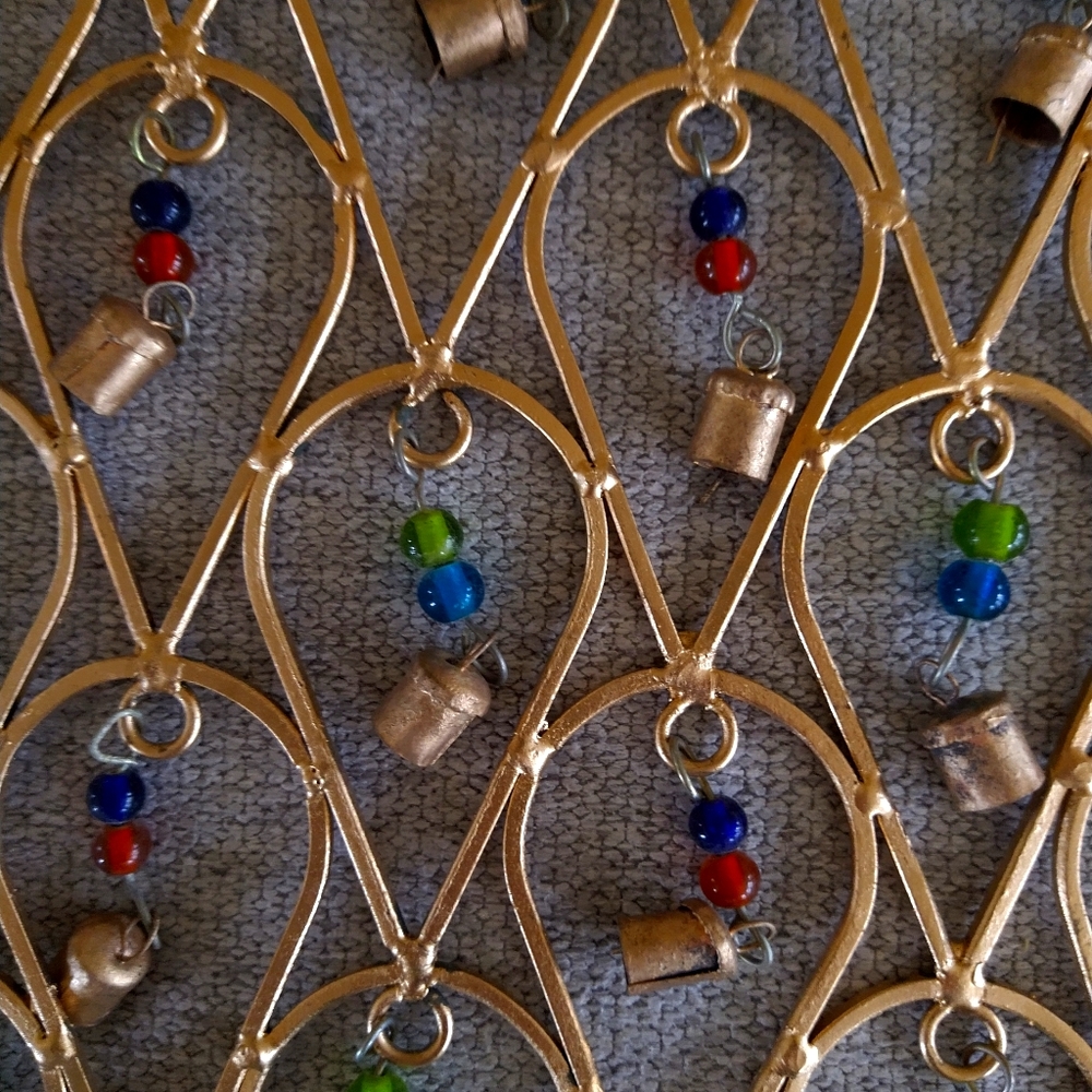 Hanging wall art with small brass bells
